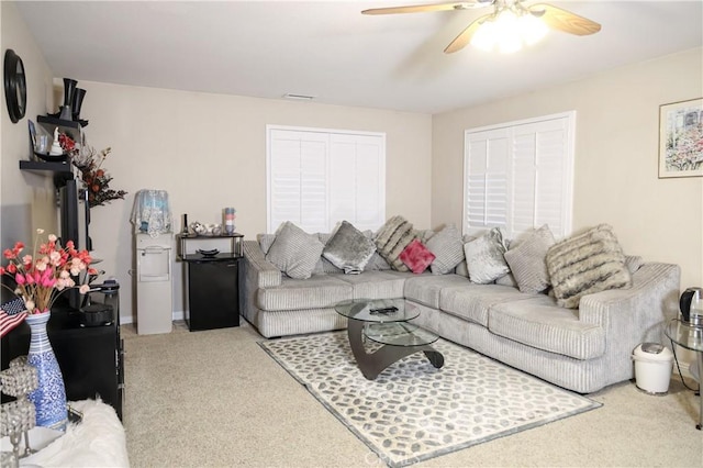 12170 Orgren Ave, Chino, CA 91710 - carpeted living room featuring a ceiling fan