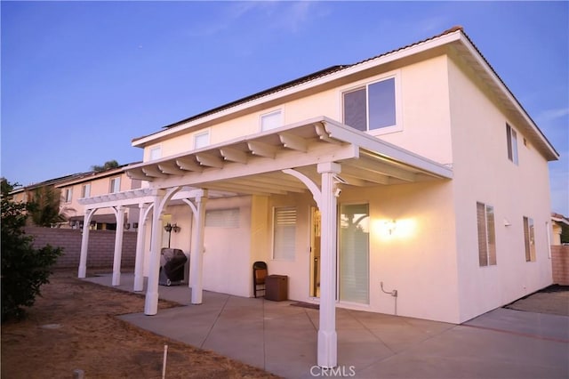 12170 Orgren Ave, Chino, CA 91710 - back of house featuring stucco siding, a pergola, and a patio area