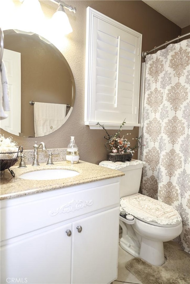 12170 Orgren Ave, Chino, CA 91710 - full bathroom featuring vanity, tile patterned floors, and a shower with curtain