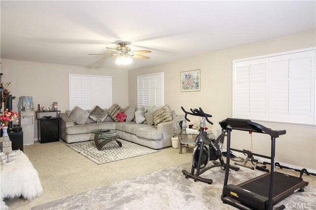 12170 Orgren Ave, Chino, CA 91710 - carpeted living room featuring a ceiling fan