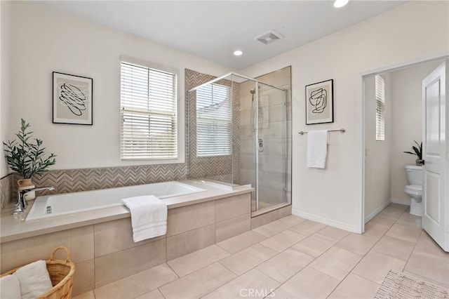 143 Hollow Tree, Irvine, CA 92618 - full bath with a bath, a shower stall, tile patterned floors, and recessed lighting
