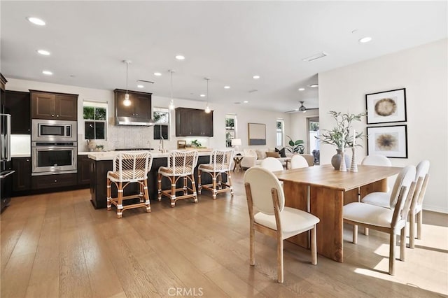 143 Hollow Tree, Irvine, CA 92618 - dining area featuring light wood-type flooring, plenty of natural light, recessed lighting, and ceiling fan