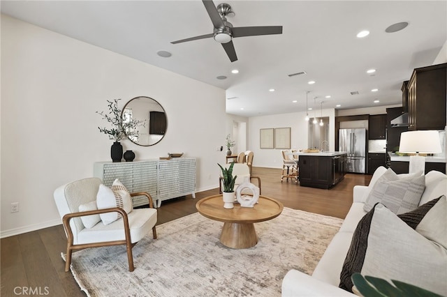 143 Hollow Tree, Irvine, CA 92618 - living area featuring dark wood-type flooring, recessed lighting, and a ceiling fan