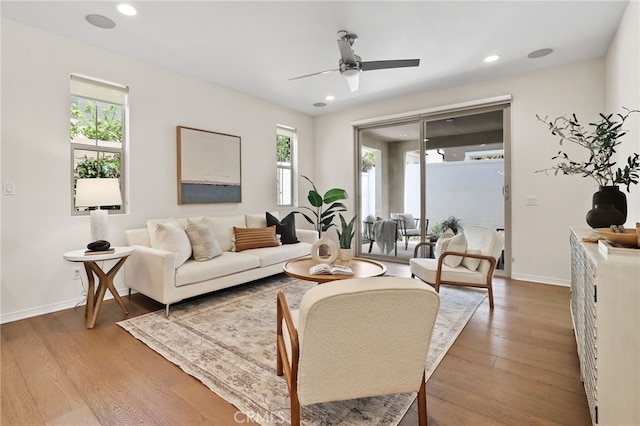 143 Hollow Tree, Irvine, CA 92618 - living area featuring healthy amount of natural light, ceiling fan, wood finished floors, and recessed lighting