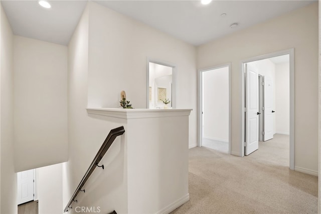 143 Hollow Tree, Irvine, CA 92618 - hall with an upstairs landing, light carpet, and recessed lighting