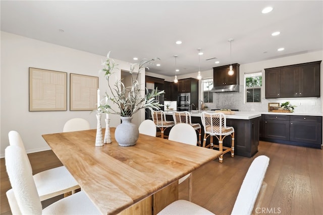 143 Hollow Tree, Irvine, CA 92618 - dining area featuring recessed lighting and dark wood-style flooring
