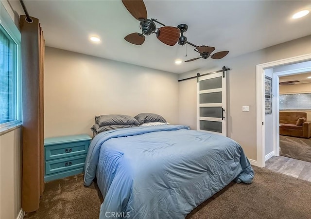 2288 Marilyn St, Simi Valley, CA 93065 - carpeted bedroom with a barn door, recessed lighting, multiple windows, and ceiling fan