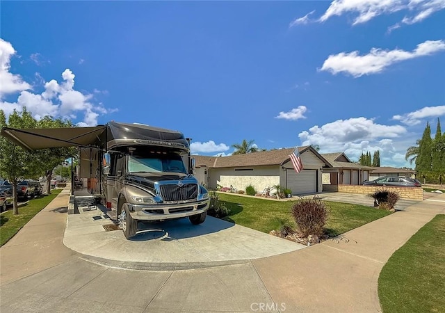 2288 Marilyn St, Simi Valley, CA 93065 - view of home's exterior with a lawn, driveway, and an attached garage