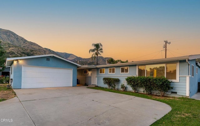 328 Bettyhill Ave, Duarte, CA 91010 - ranch-style house with a mountain view, an attached garage, and driveway
