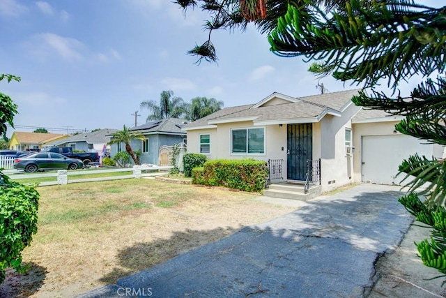 12029 Greyford St, Whittier, CA 90606 - bungalow-style home featuring stucco siding, driveway, and roof with shingles