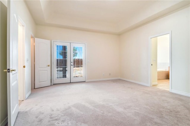 11471 Azure View Rd, Pinon Hills, CA 92372 - unfurnished room featuring french doors, light carpet, and a raised ceiling