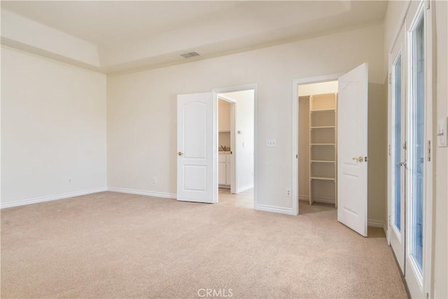 11471 Azure View Rd, Pinon Hills, CA 92372 - unfurnished bedroom featuring light carpet, a spacious closet, and a closet
