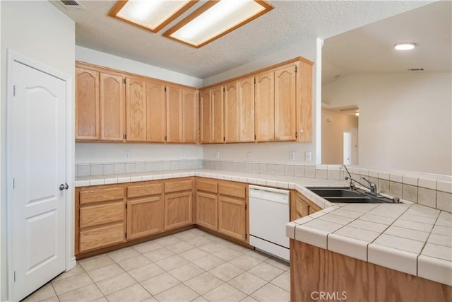 11471 Azure View Rd, Pinon Hills, CA 92372 - kitchen with dishwasher, light tile patterned floors, lofted ceiling, a peninsula, and tile countertops