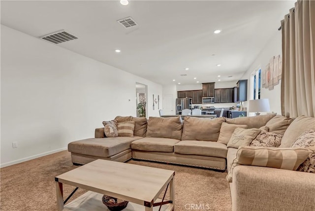 2146 N Rinaldi Ct, Visalia, CA 93291 - living room featuring carpet flooring and recessed lighting