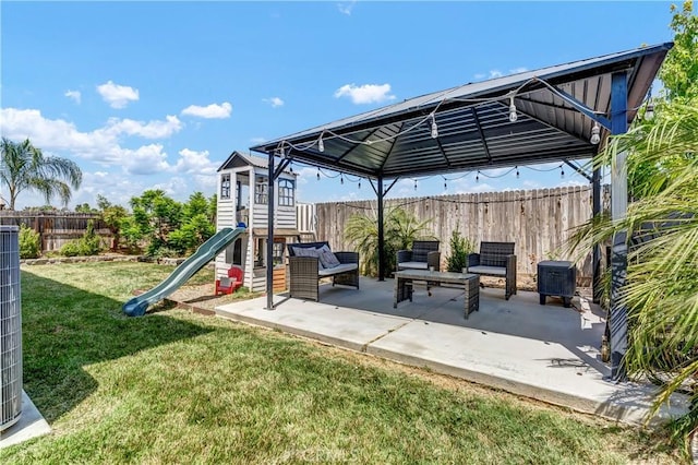 2146 N Rinaldi Ct, Visalia, CA 93291 - fenced backyard with a playground, a gazebo, and a patio