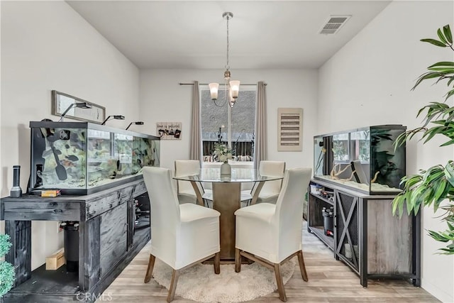 2146 N Rinaldi Ct, Visalia, CA 93291 - dining space with light wood finished floors