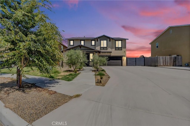 2146 N Rinaldi Ct, Visalia, CA 93291 - view of front of house with driveway, a garage, and stucco siding
