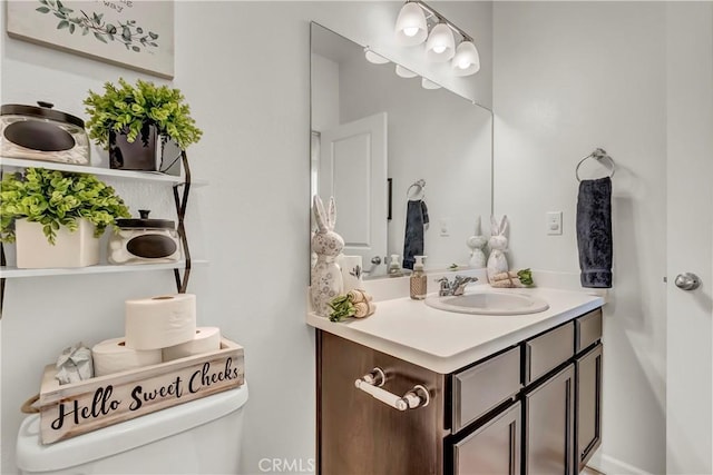 2146 N Rinaldi Ct, Visalia, CA 93291 - bathroom featuring vanity and toilet