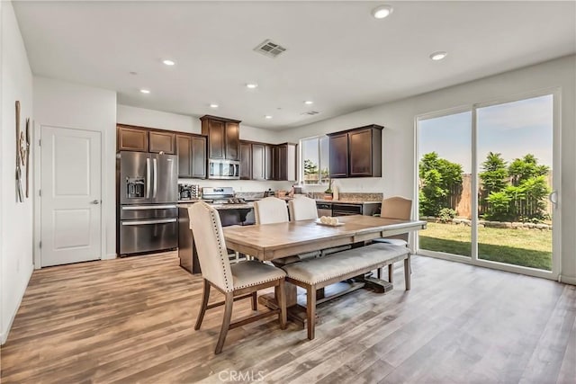 2146 N Rinaldi Ct, Visalia, CA 93291 - dining area with light wood-type flooring and recessed lighting
