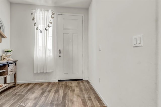 2146 N Rinaldi Ct, Visalia, CA 93291 - entrance foyer featuring wood finished floors and baseboards