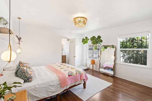 205 C St, Chula Vista, CA 91910 - bedroom with wood finished floors and a chandelier