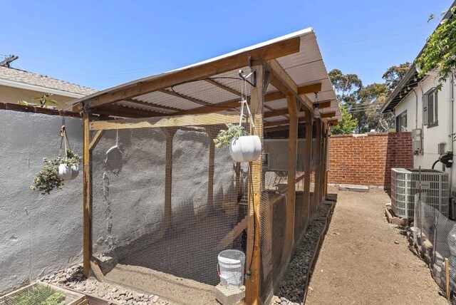 205 C St, Chula Vista, CA 91910 - view of patio with exterior structure and an outbuilding
