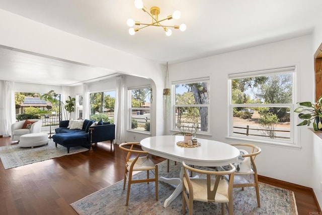 205 C St, Chula Vista, CA 91910 - dining area with plenty of natural light, dark wood-style floors, and a chandelier