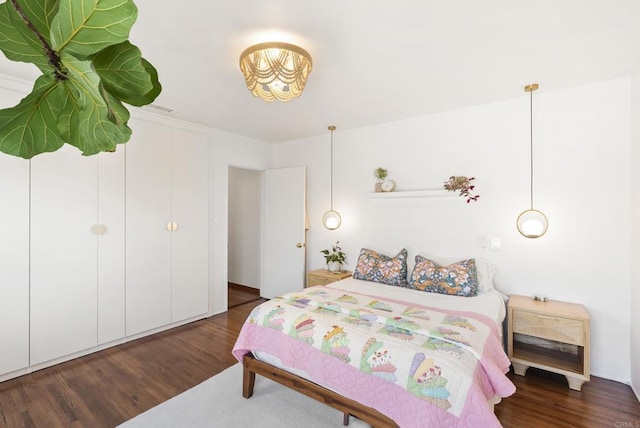 205 C St, Chula Vista, CA 91910 - bedroom with wood finished floors and a chandelier