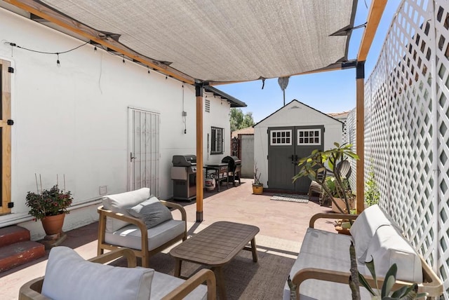 205 C St, Chula Vista, CA 91910 - view of patio / terrace with a storage shed, grilling area, an outdoor hangout area, and electric panel