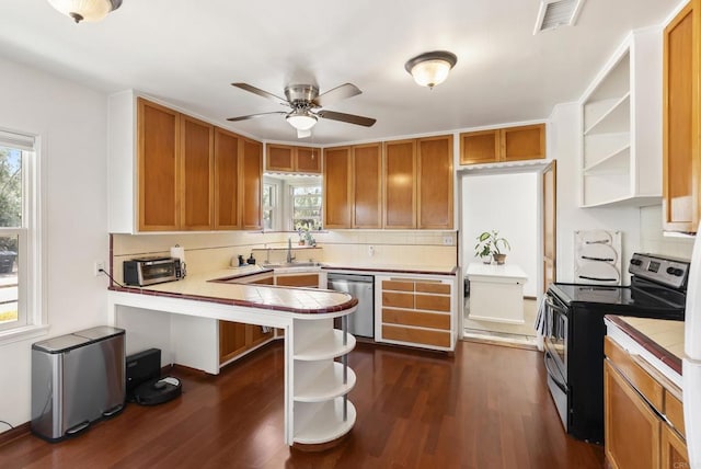 205 C St, Chula Vista, CA 91910 - kitchen featuring open shelves, appliances with stainless steel finishes, tile countertops, tasteful backsplash, and plenty of natural light