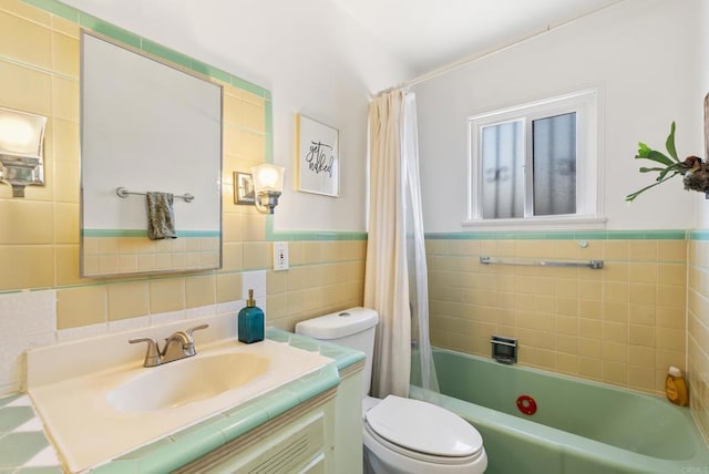 205 C St, Chula Vista, CA 91910 - bathroom featuring tile walls, vanity, shower / bath combination with curtain, and a wainscoted wall