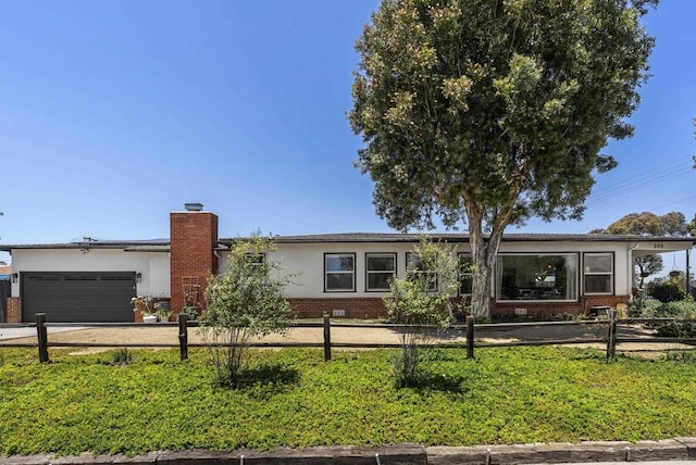 205 C St, Chula Vista, CA 91910 - ranch-style home featuring an attached garage, a chimney, stucco siding, concrete driveway, and brick siding
