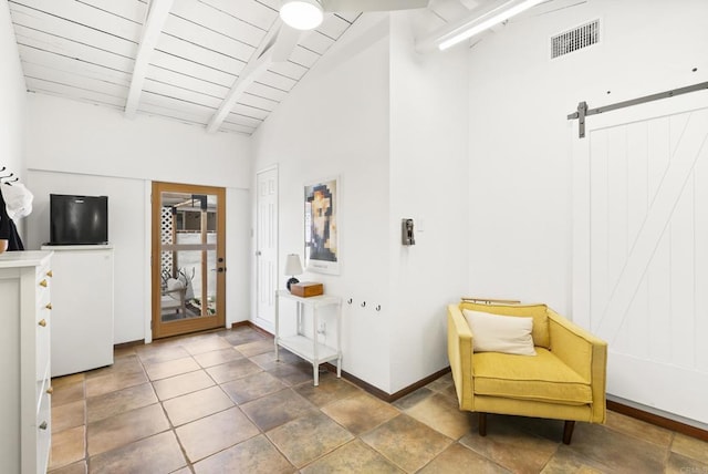 205 C St, Chula Vista, CA 91910 - sitting room with a barn door, a wooden ceiling with exposed beams, and high vaulted ceiling