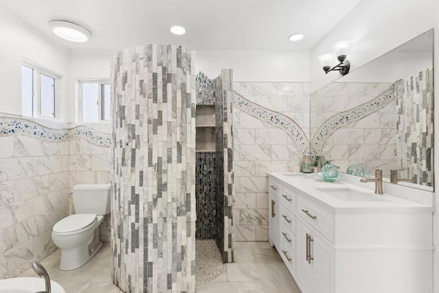 12405 Royal Rd, El Cajon, CA 92021 - bathroom with tile walls, vanity, and marble finish flooring