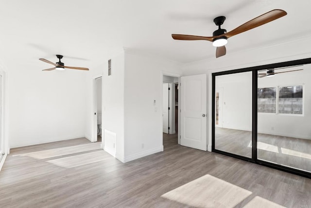 12405 Royal Rd, El Cajon, CA 92021 - empty room with ceiling fan, wood finished floors, and ornamental molding