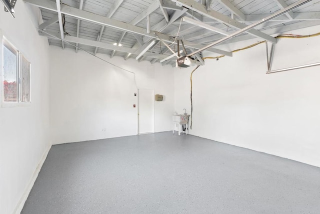 12405 Royal Rd, El Cajon, CA 92021 - garage with a garage door opener and a sink