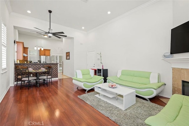 5517 Welland Ave Unit B, Temple City, CA 91780 - living area featuring recessed lighting, dark wood finished floors, a ceiling fan, crown molding, and a fireplace