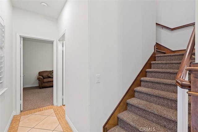5517 Welland Ave Unit B, Temple City, CA 91780 - stairs featuring tile patterned flooring and baseboards