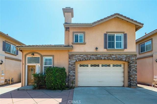 5517 Welland Ave Unit B, Temple City, CA 91780 - mediterranean / spanish home with stucco siding, driveway, stone siding, an attached garage, and a chimney