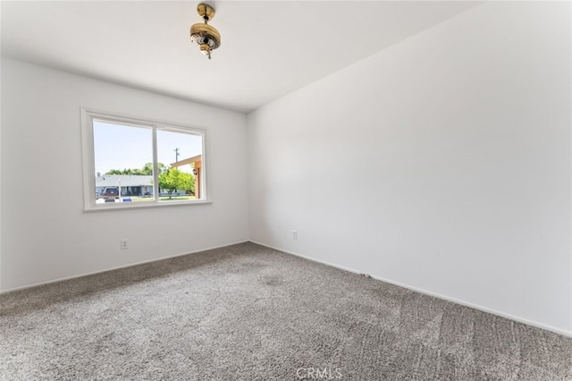 9726 Kimberly Ave, Montclair, CA 91763 - carpeted spare room with baseboards