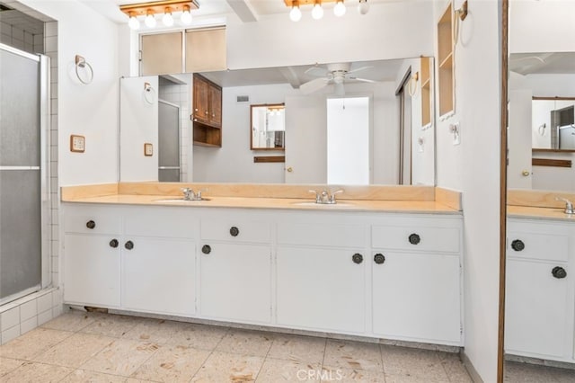 9726 Kimberly Ave, Montclair, CA 91763 - bathroom with ceiling fan, double vanity, and a stall shower