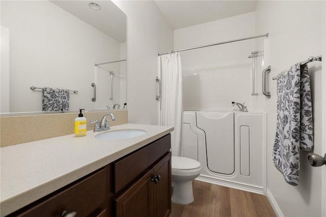 30644 Stage Coach Rd, Menifee, CA 92584 - bathroom with vanity and wood finished floors