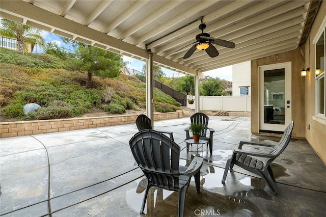 30644 Stage Coach Rd, Menifee, CA 92584 - fenced backyard with a patio area and ceiling fan
