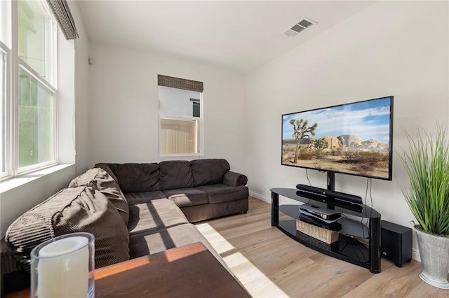 30644 Stage Coach Rd, Menifee, CA 92584 - living area featuring light wood-style floors and baseboards