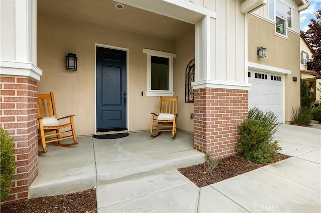 30644 Stage Coach Rd, Menifee, CA 92584 - view of exterior entry with board and batten siding, an attached garage, a porch, and stucco siding