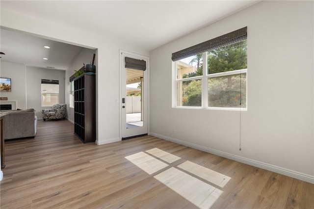 30644 Stage Coach Rd, Menifee, CA 92584 - empty room with light wood-style floors and recessed lighting