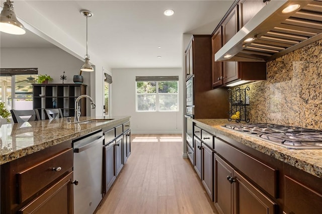 30644 Stage Coach Rd, Menifee, CA 92584 - kitchen with stainless steel appliances, ventilation hood, backsplash, pendant lighting, and light wood finished floors
