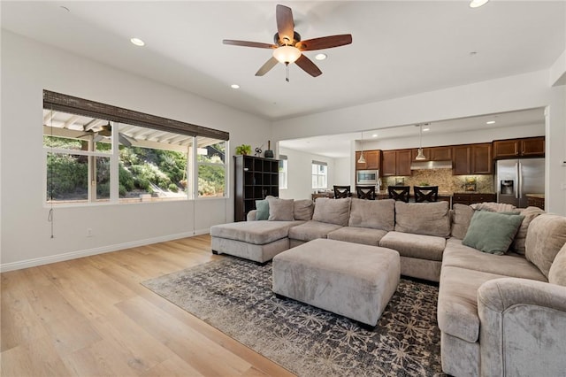 30644 Stage Coach Rd, Menifee, CA 92584 - living area with a ceiling fan, light wood-type flooring, and recessed lighting