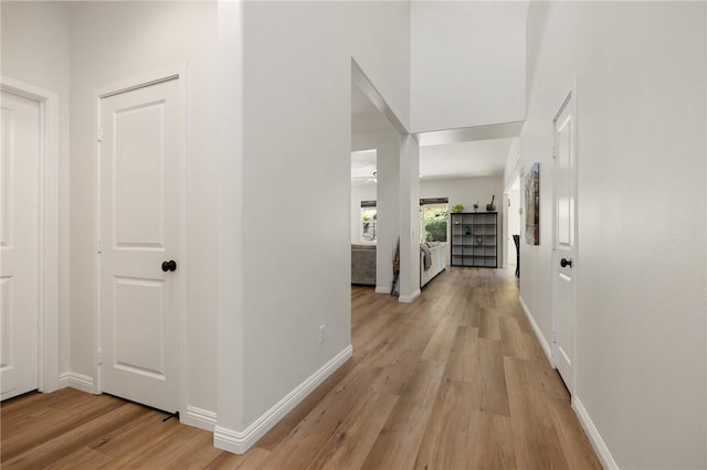 30644 Stage Coach Rd, Menifee, CA 92584 - hall with light wood-style floors and baseboards
