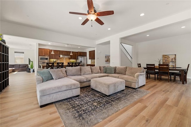 30644 Stage Coach Rd, Menifee, CA 92584 - living room with recessed lighting, light wood finished floors, stairs, and ceiling fan